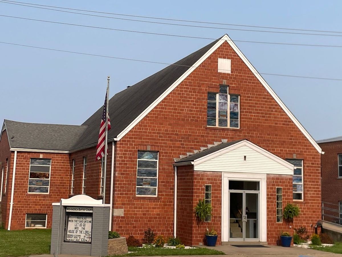 The Mid-America Baptist Church building with the church sign out front